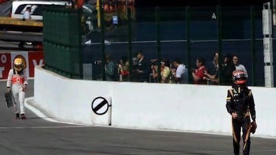 Romain Grojean, left, and Lewis Hamilton both had tough weekends at Spa.