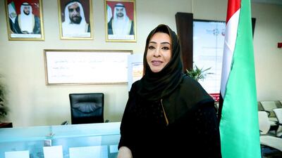 Jameela Al Shaiba Al Hameli, assistant general manager for corporate services at TransAD, encourages Emirati women to get an education and stand up for themselves. Fatima Al Marzooqi / The National