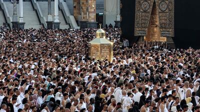 Muslim worshippers gather before the Kaaba, Islam's holiest shrine, at the Grand Mosque in Makkah
