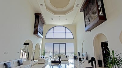 The ceiling in the lounge is exceptionally high, creating a regal effect. Courtesy Fine and Country International