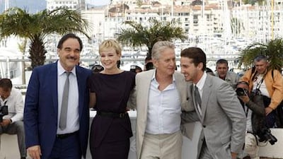 From left, Oliver Stone, Carey Mulligan, Michael Douglas and Shia LaBeouf in holiday mood in Cannes, where their film Wall Street: Money Never Sleeps was screened at the 63rd international film festival.