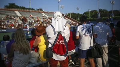 People watch a match at one of the side courts at the 2014 US Open tennis tournament in New York. Shannon Stapleton / Reuters / August 26, 2014