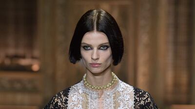 Many looks were pieced from delicate lace, including this drop shouldered look for Dior. Getty Images