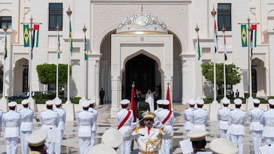 Sheikh Mohamed bin Zayed, Crown Prince of Abu Dhabi and Deputy Supreme Commander of the UAE Armed Forces, welcomes Jair Bolsonaro, President of Brazil, to the Presidential Palace in Abu Dhabi on Sunday. Courtesy Sheikh Mohamed bin Zayed Twitter
