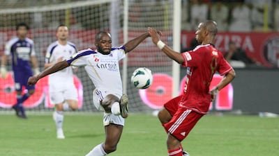 Matar challenges Al Ain's Jires Kembo-Ekoko for the ball. Jaime Puebla / The National