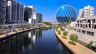 Aldar's headquarters in Abu Dhabi. Aldar last month reported a 10 per cent annual jump in its second-quarter profit. Victor Besa / The National