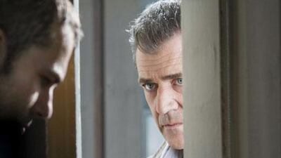 Shawn Roberts and Mel Gibson in Edge of Darkness, a workmanlike thriller brought to life by Gibson's frenetic portrayal of a grieving, vengeful father on the brink of a nervous breakdown.