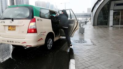 Larger taxis will now be the only ones to pick passengers up at Dubai airport. Christopher Pike / The National