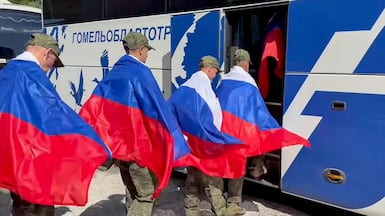 Russian servicemen return home as part of a prisoner exchange with Ukraine last year. EPA