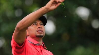 Tiger Woods checks the conditions on the second hole at Bay Hill.