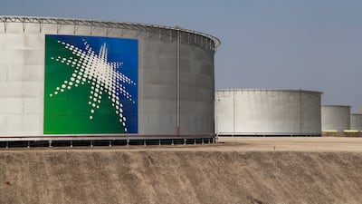 Branded oil tanks at a Saudi Aramco oil facility in Abqaiq, Saudi Arabia. Reuters