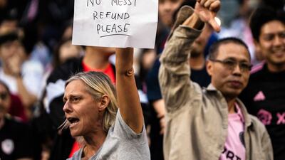 Fans react during the friendly match between a Hong Kong XI and MLS side Inter Miami at the Hong Kong Stadium on Sunday, February 4, 2024. Lionel Messi remained on the bench, resulting in angry reactions from the capacity crowd. AP
