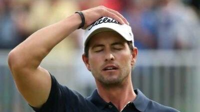 LYTHAM ST ANNES, ENGLAND - JULY 22: Adam Scott of Australia reacts to a missed par putt on the 18th green during the final round of the 141st Open Championship at Royal Lytham & St. Annes Golf Club on July 22, 2012 in Lytham St Annes, England. (Photo by Andrew Redington/Getty Images) *** Local Caption *** 149043680.jpg