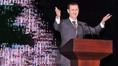 Syrian president Bashar Al Assad delivered his speech in front of a Syrian flag made of pictures of people allegedly killed during the uprising. “They (his opponents) are the enemies of the people and the enemies of God. The enemies of God will go to hell,” he said.