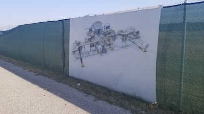 The Ashland, Kentucky, steel rolling plant was due to open in spring 2020, but today an open, grassy space is all that lies behind a metal fence. Photo: Stephen Starr