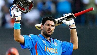 India's Yuvraj Singh celebrates his century against West Indies in Chennai. Kirsty Wigglesworth / AP Photo