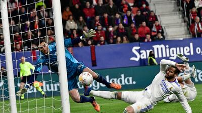 Real Madrid defender Nacho, right, misses a scoring opportunity against Osasuna. AP