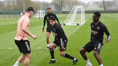 Kieran Tierney, Hector Bellerin and Flo Balogun of Arsenal during training. Getty
