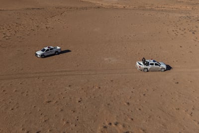 Syrian vehicles patrolling in the desert. Ahmad Fallaha for The National