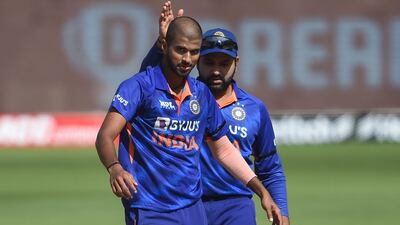 Off-spinner Washington Sundar, left, after the dismissal of West Indies' Brandon King at the Narendra Modi Stadium in Motera, Ahmedabad. AFP