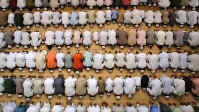 Indian Muslims offer prayers during Eid al-Adha at the Vasi Ullah mosque in Allahabad, India. Rajesh Kumar Singh / AP Photo