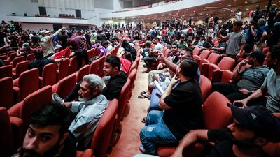 The protesters sit in the building, in Baghdad's high-security Green Zone. AFP