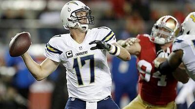 San Diego Chargers quarterback Philip Rivers passes against the San Francisco 49ers during the third quarter of an NFL football game in Santa Clara, Calif., Saturday, Dec. 20, 2014. (AP Photo/Ben Margot)