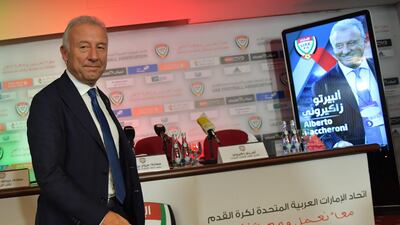 Alberto Zaccheroni poses for photos during his presentation as the new UAE manager. Giusepppe Cacace / AFP