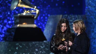 A touching moment: The children of late Chris Cornell Toni Cornell and Christopher Cornell Jr accept the award for Best Rock performance for 'When Bad Does Good' on behalf of their father, Chris Cornell. Cornell died in May 2017. AFP