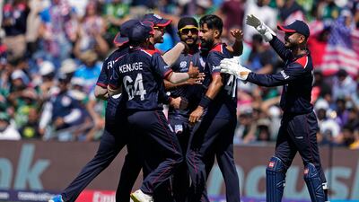 Muhammad Ali-Khan celebrates with teammates after the dismissing Pakistan's Fakhar Zaman. AP
