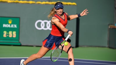 Paula Badosa, of Spain, returns a volley while playing Victoria Azarenka, of Belarus. AP Photo