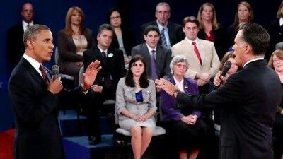 President Barack Obama and Republican presidential candidate Mitt Romney argue a point during the second 2012 Presidential Debate at Hofstra University in Hempstead, New York.
