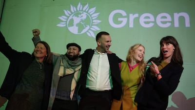 Green Party leader Zack Polanski and Green Party winning candidate Hannah Spencer celebrate after the vote count for the Gorton and Denton by-election in Manchester. EPA