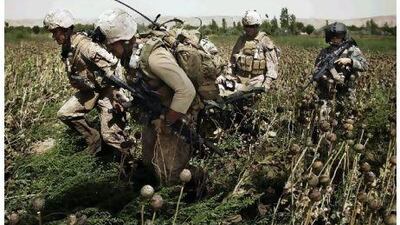 United States Marines rush a wounded colleague to a waiting helicopter in Helmand province, southern Afghanistan, Up to May 2, 11,191 members of the US military have been wounded in the war in Afghanistan, including 35 per cent so severely as to preclude their return to combat.