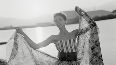 Dress with petticoat, Dh33,000; and belt, Dh2,300, all from Christian Dior.