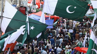 People in Karachi prepare to celebrate Pakistan's Independence Day last year. Climate change, water scarcity, floods, power cuts, separatism and cross-border extremism are just a few of the problems today's government must grapple with. EPA