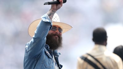 Post Malone performs during the closing ceremony before the Fifa World Cup 2026 Final between Spain and Argentina at New York New Jersey Stadium. AFP