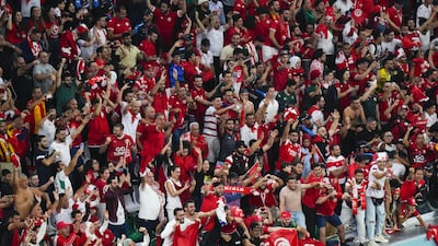 Fans of Tunisia cheer for their team during the World Cup group D soccer match between Tunisia and France at the Education City Stadium in Al Rayyan, Qatar. AP Photo