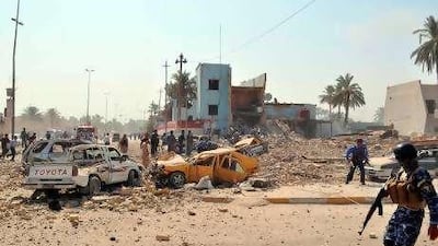 A car bombing in the city of Kut, 160km south-east of Baghdad, was one of a series of apparently co-ordinated attacks around Iraq last month.