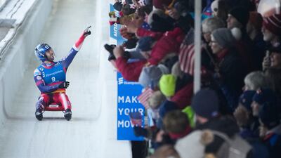 Chris Mazdzer, of the United States, gestures to the crowd at the Luge World Cup at Lake Placid, New York. AP Photo