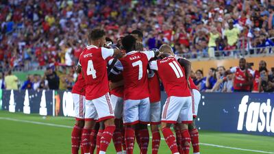 Arsenal players celebrate Gabriel Jesus's opening goal against Chelsea. Getty