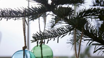 Coloured glass is a simple and effective decorating trend this Christmas. Photo: Ikea