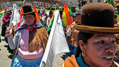 Supporters of Bolivian president Evo Morales march to show their support as the opposition disputes results announced by the electoral court on Monday. AFP