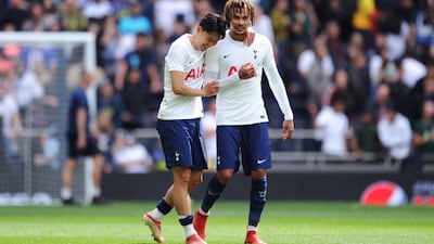 Son Heung-Min and Dele Alli of Tottenham Hotspur celebrate at full-time.