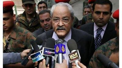 Samir Radwan, the Egyptian finance minister, backed down from imposing a tax on dividend payments after widespread criticism. Mohamed Omar / EPA