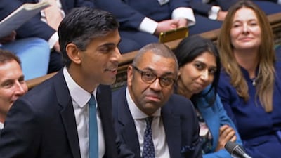 Ms Braverman, second right, watches Mr Sunak during his first Prime Minister's Questions in the House of Commons in 2022. AFP