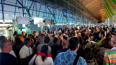 Hundreds of people await at Madrid-Barajas Adolfo Suarez Airport as flights to the Canary islands have been either canceled or delayed, in Madrid, Spain. EPA