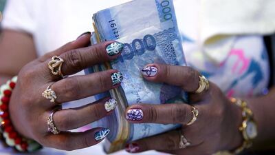 How much are expatriate workers in the UAE saving for when they eventually return to their country of origin? Erik De Castro / Reuters