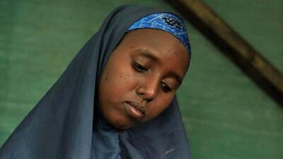 July 11, 2011: Marwo Maalin feeds her son, one-year-old Habibo Bashir, as part of his treatment for severe malnutrition, at a Doctors Without Borders hospital, in Dagahaley Camp, outside Dadaab, Kenya. (AP Photo/Rebecca Blackwell)