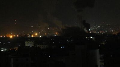 An explosion by Israeli air strikes is seen in Gaza City. Israeli forces struck targets across the Gaza Strip in response to rocket attacks and balloons from Gaza to the Israeli cities. AP